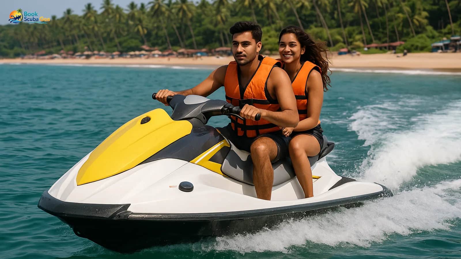 Jet ski cutting across clear coastal water near a Goa beach